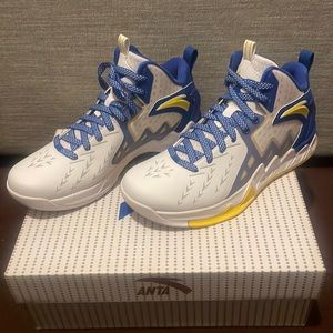 These are brand new Klay Thompson shoes. They are while, yellow and blue.